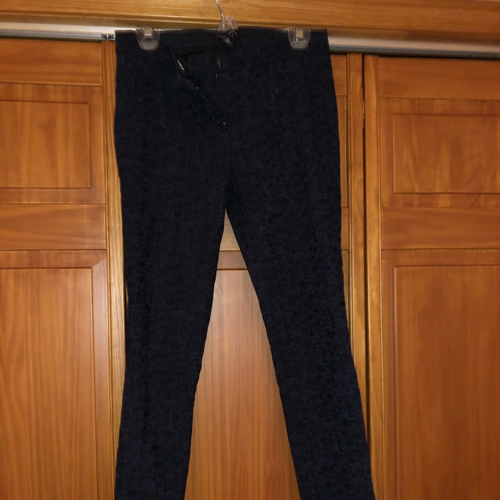 Black and blue dress pants textured